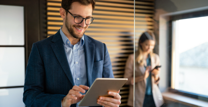 Businessman using tablet and working in office
