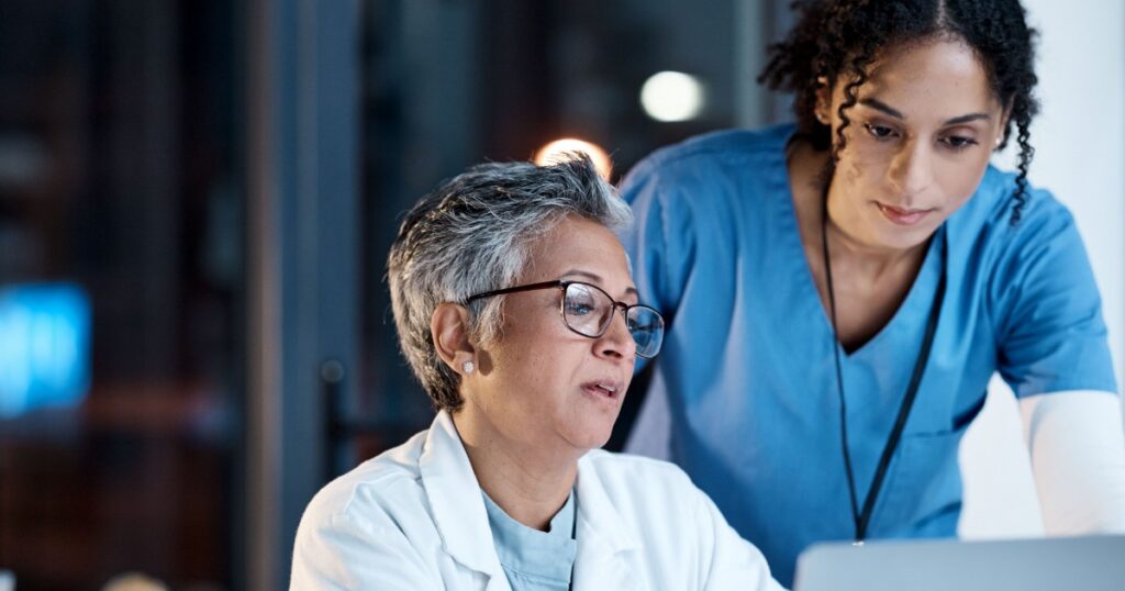 medical team analyzing the clinical information of a patient