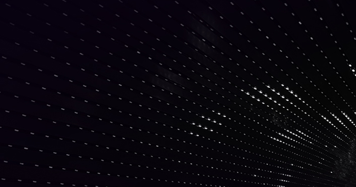 Dark dotted texture background.