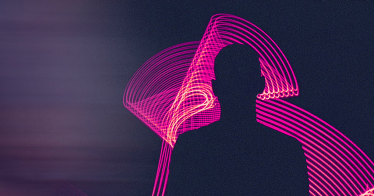 Silhouette of a person outlined by pink light spirals.