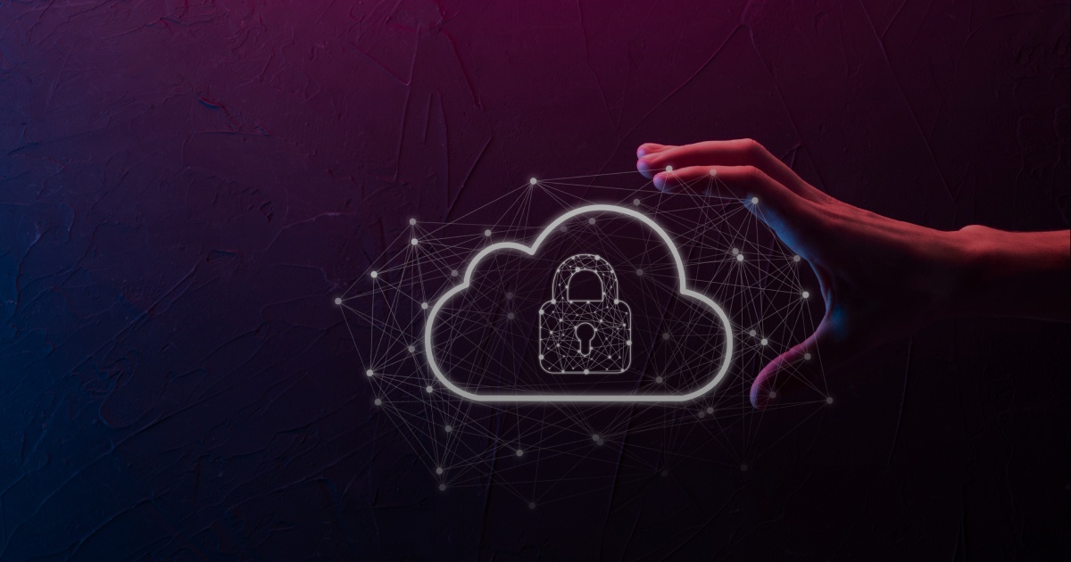 Hand reaching to a glowing cloud with a padlock, representing cloud security.
