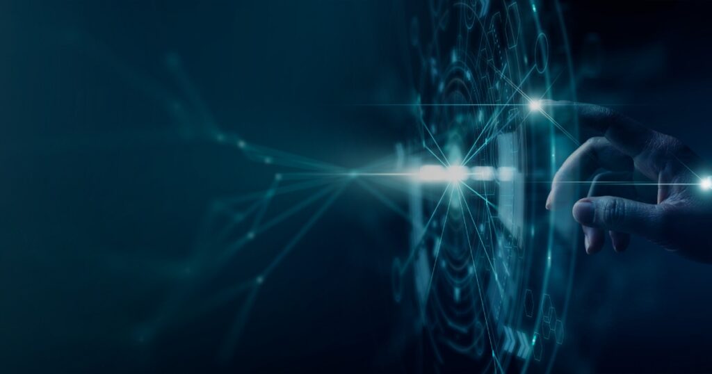 Hands reaching toward a glowing network node in teal light.