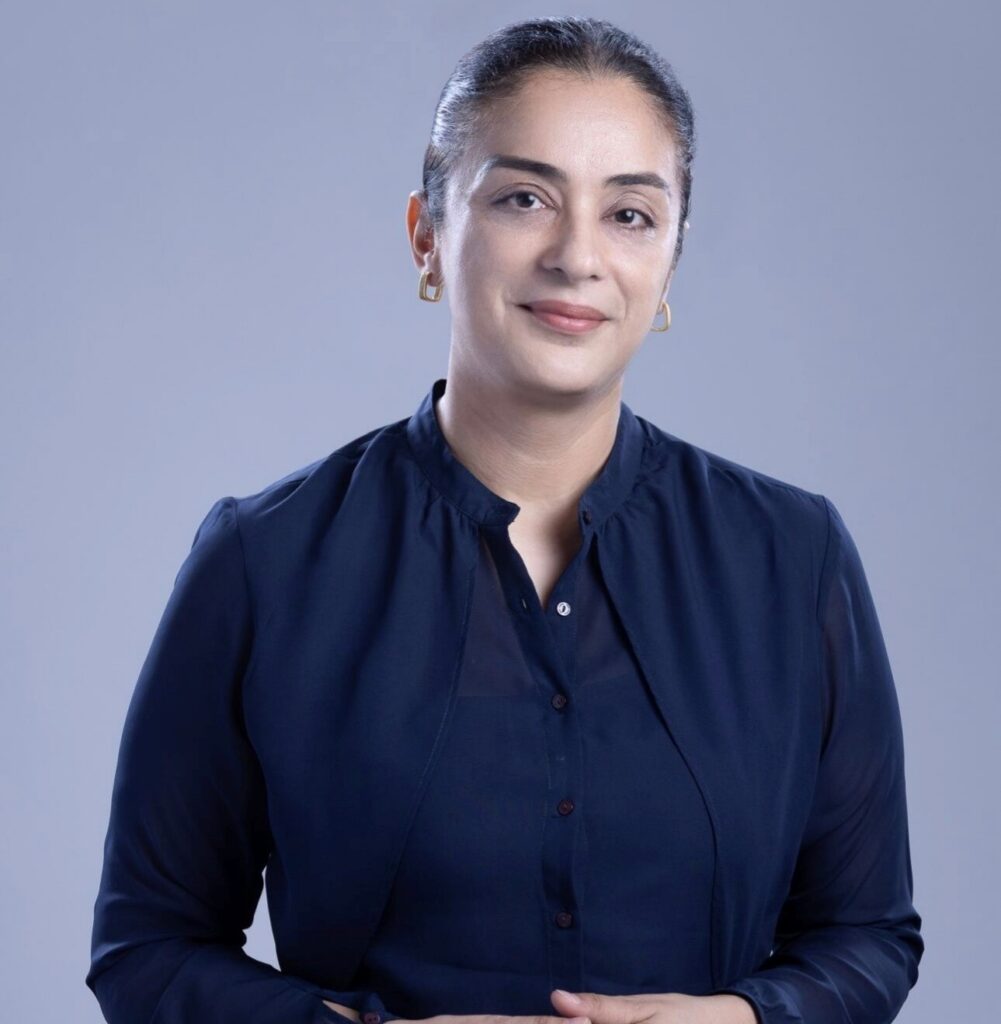 Headshot of Gulveen Kaur.