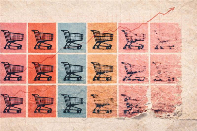 Warhol-style grid of shopping carts in alternating colors with a rising arrow, representing ecommerce growth straining the AI economy.