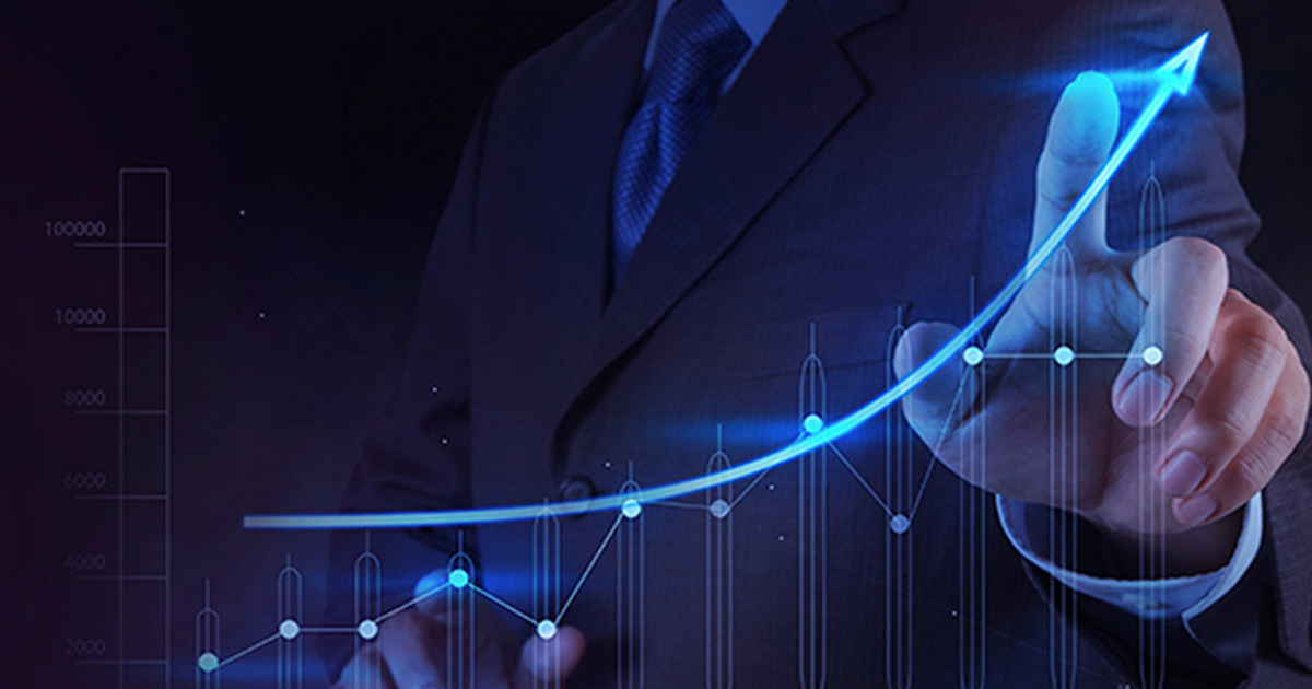 Businessman touching a rising holographic growth curve, representing business acceleration with Business Process as a Service.