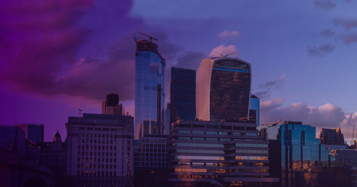 London skyline with modern skyscrapers at dusk.