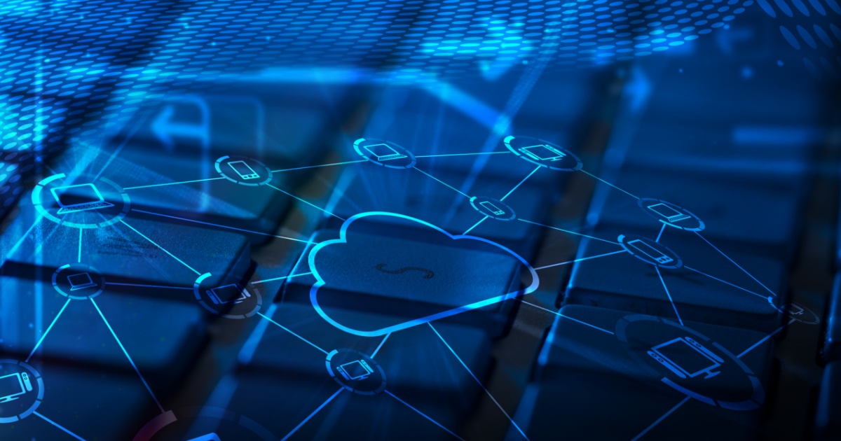 Glowing blue circuit board with a cloud symbol etched at its center, representing app modernization and cloud migration.