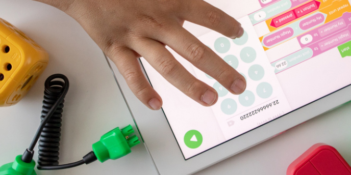 person making a calculation using a tablet