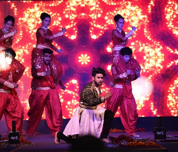 Traditional dance performance on stage during Tandem Event 2024